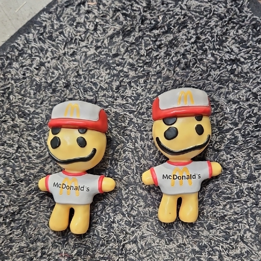 McDonald's Smiling Figures - Red, Yellow, and Black